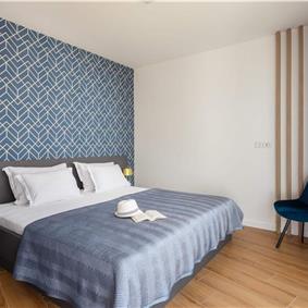 Luxury Beachfront Villa with Heated Infinity Pool near Trogir, Sleeps 8